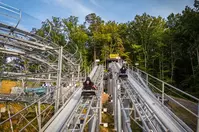 riders on Pigeon Forge Racing Coaster